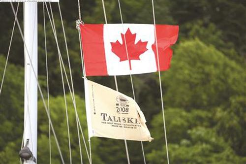 Canadian flag proudly flying on the stern of Sealgair caught a lot of attention. © Christine Spreiter